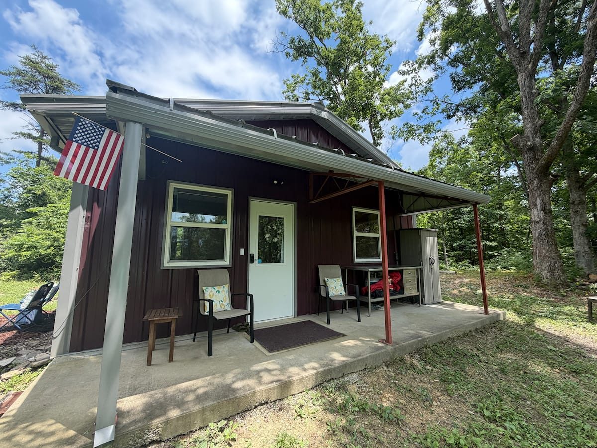 The cabin's front porch on a sunny summer day
